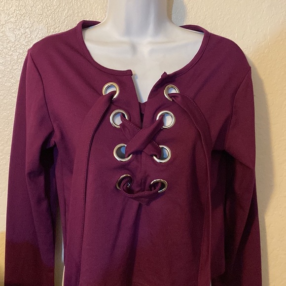 Rue 21 eggplant long sleeve top with large grommets lace up - Picture 3 of 5